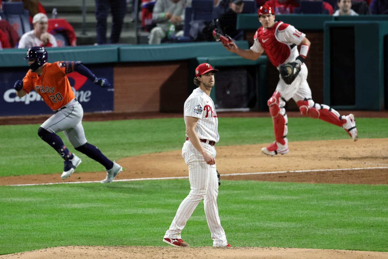 PHILADELPHIA, PENNSYLVANIA - NOVEMBER 02: Aaron Nola #27 of the Philadelphia Phillies reacts after Chas McCormick #20 of the Houston Astros hits a single during the fifth inning in Game Four of the 2022 World Series at Citizens Bank Park on November 02, 2022 in Philadelphia, Pennsylvania. (Photo by Sarah Stier/Getty Images)