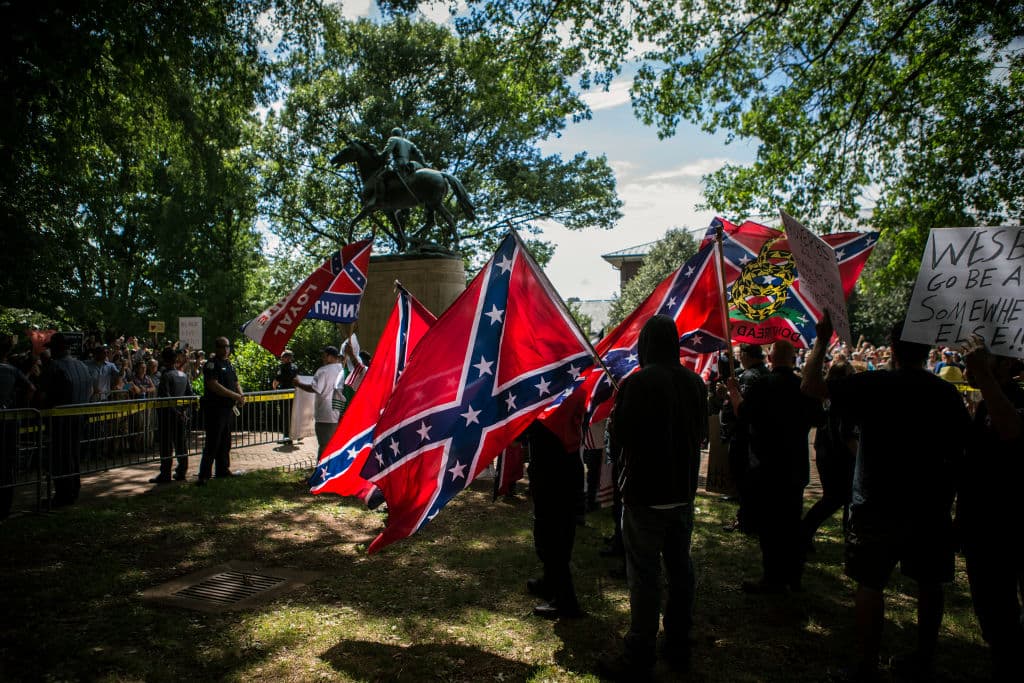 According to authorities, there were some 50 KKK members and sympathizers present.