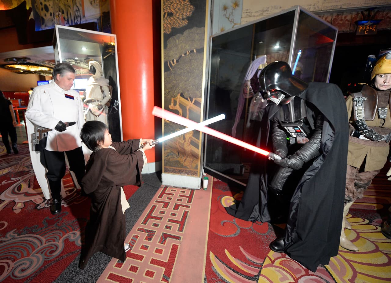 HOLLYWOOD, CA - DECEMBER 15: Fans interact with performers at the Opening Night Celebrations of Walt Disney Pictures and Lucasfilm's "Rogue One: A Star Wars Story" at The TCL Chinese Theatre on December 15, 2016 in Hollywood, California. (Photo by Kevork Djansezian/Getty Images)
