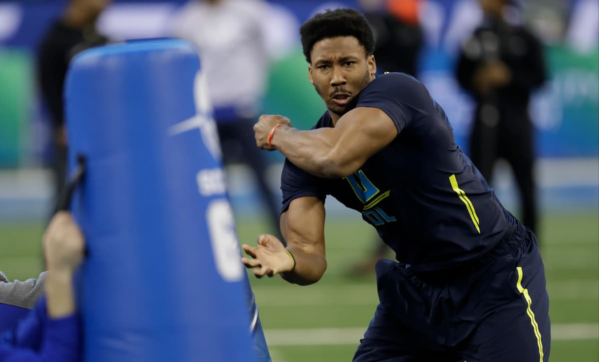 Texas A&M defensive end Myles Garrett runs a drill at the NFL football scouting combine Sunday, March 5, 2017, in Indianapolis. (AP Photo/David J. Phillip)