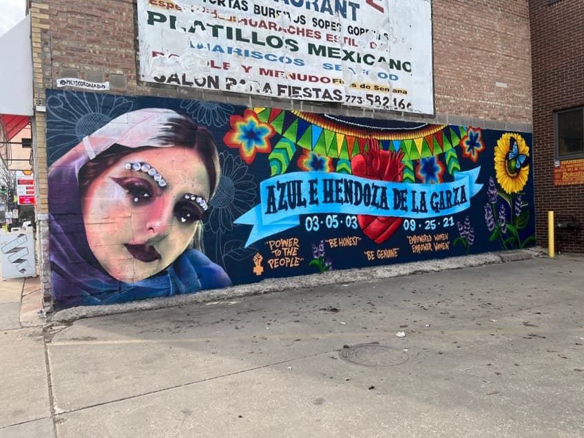 Mural Azul de la Garza. La adolescente sufrió múltiples heridas de bala en el torso. Fue llevada al hospital Monte Sinai en condición crítica y falleció más tarde el 25 de septiembre de 2021.