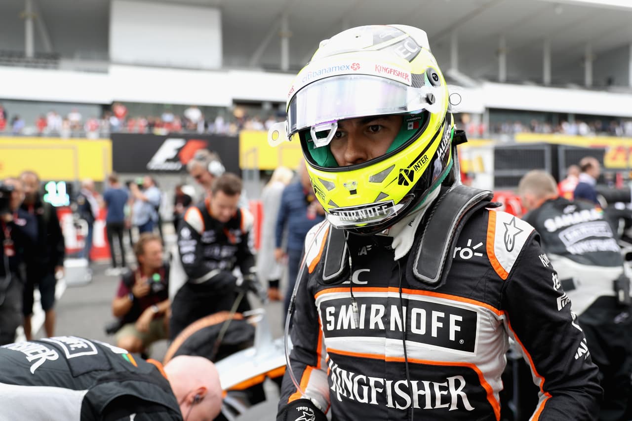 SUZUKA, JAPAN - OCTOBER 09: Sergio Perez of Mexico and Force India on the grid during the Formula One Grand Prix of Japan at Suzuka Circuit on October 9, 2016 in Suzuka. (Photo by Mark Thompson/Getty Images)