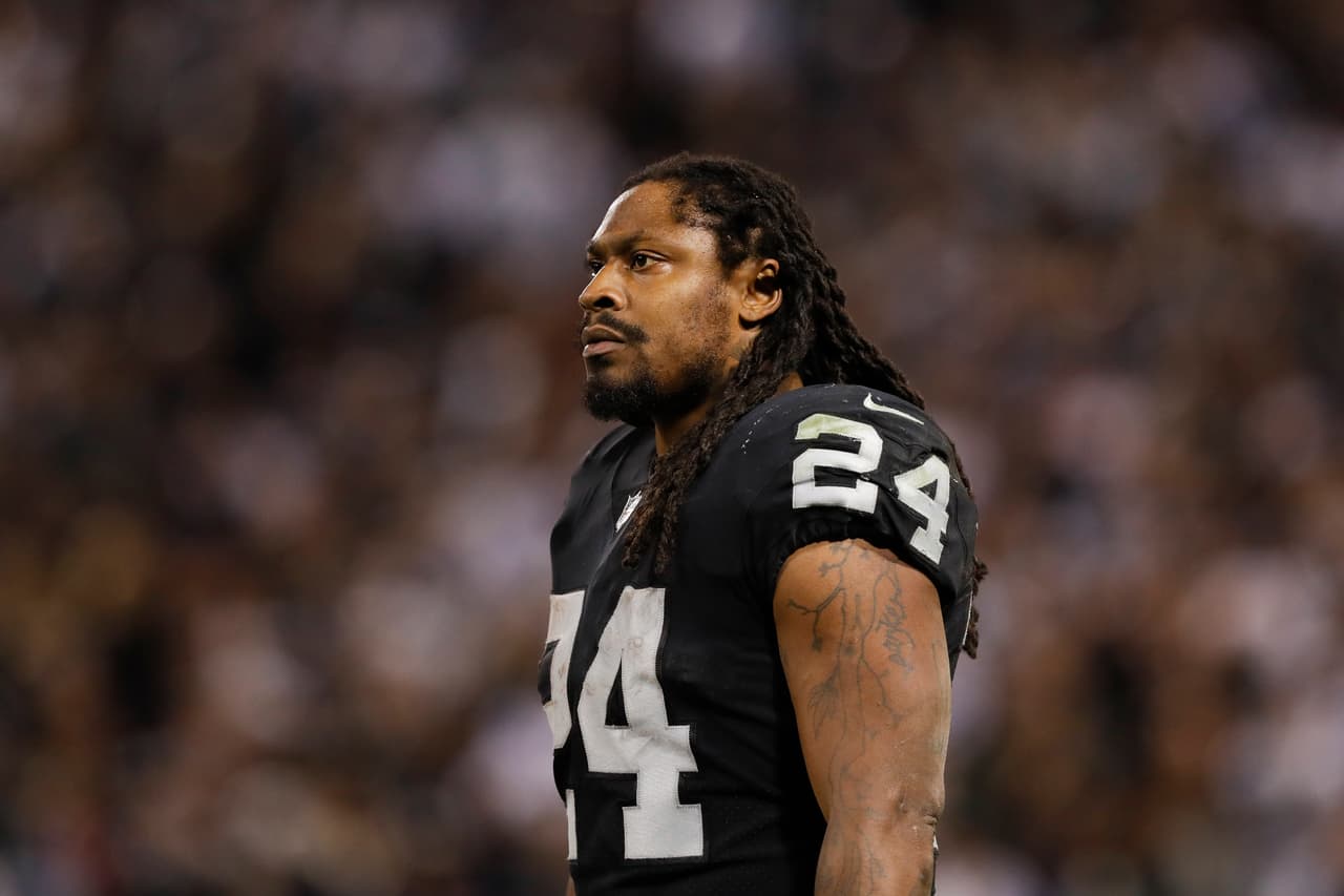 Oakland Raiders running back Marshawn Lynch (24) looks on during a week 15 NFL football game against the Dallas Cowboys on Sunday, Dec. 17, 2017 in Oakland, Calif. Dallas won 20-17. (Aaron M. Sprecher via AP)