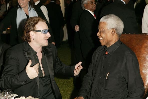 Mandela y Bono celebraron juntos Thanksgiving en Sudáfrica en 2003.