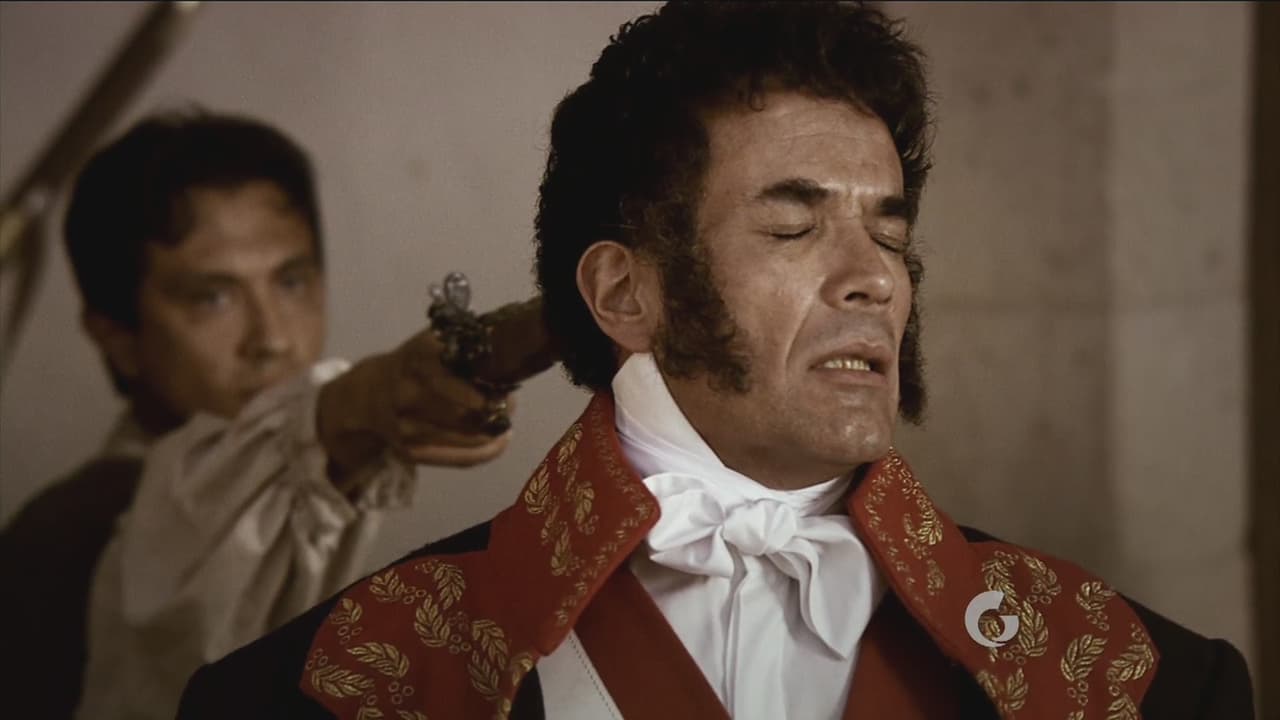 Riaño es asesinado ante los ojos de su esposa.