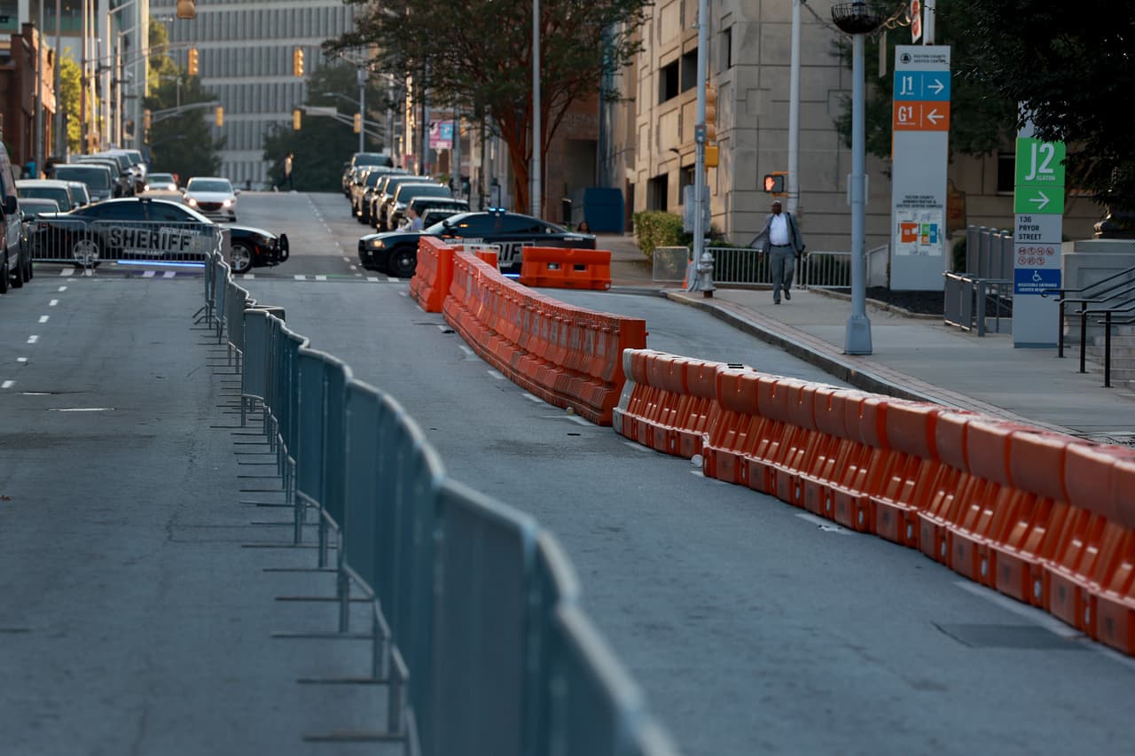 ATLANTA, GEORGIA - AUGUST 08: Barricades run along the street in front of the Fulton County Courthouse on August 08, 2023 in Atlanta, Georgia. The courthouse has more security in place as Fulton County District Attorney Fani Willis is expected to announce soon a possible grand jury indictment in her investigation into former President Donald Trump and his Republican allies' alleged attempt to overturn the 2020 election in the state. (Photo by Joe Raedle/Getty Images)