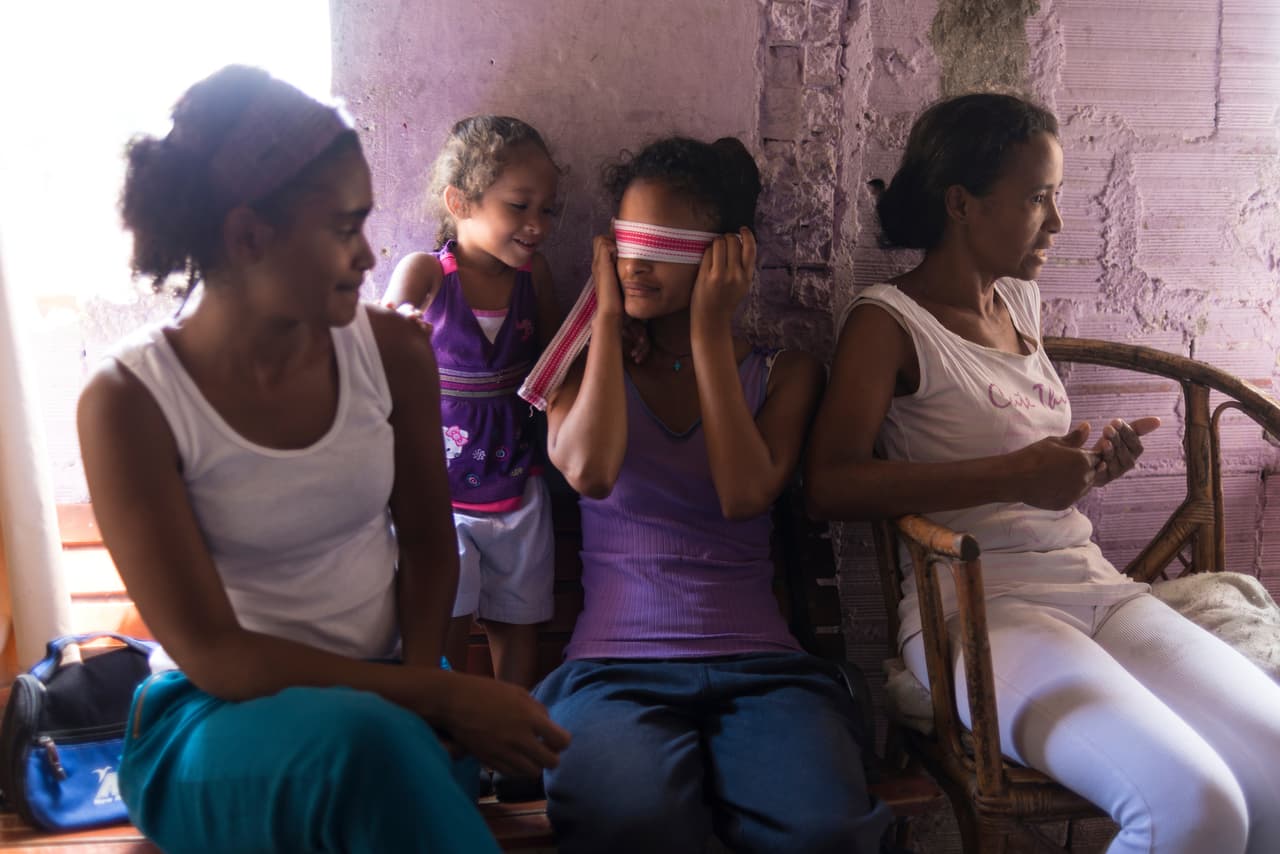 Paula lives in Petare, Caracas, with her eight daughters, a niece and her sick father.