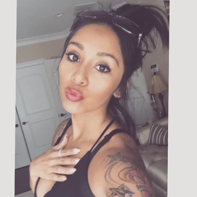 Snooki: "Recordando a todos aquellos que perdimos el 9/11. Nunca olvidemos ese día tan trágico y a las hermosas almas que perdimos".