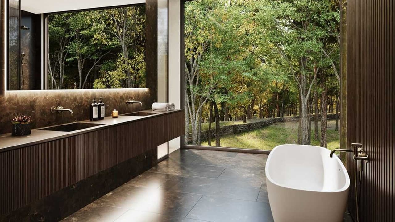 La residencia está diseñada de tal forma que pueda integrarse con el entorno natural, proporcionando vistas únicas a los árboles que la rodean y a las Montañas de Catskill.