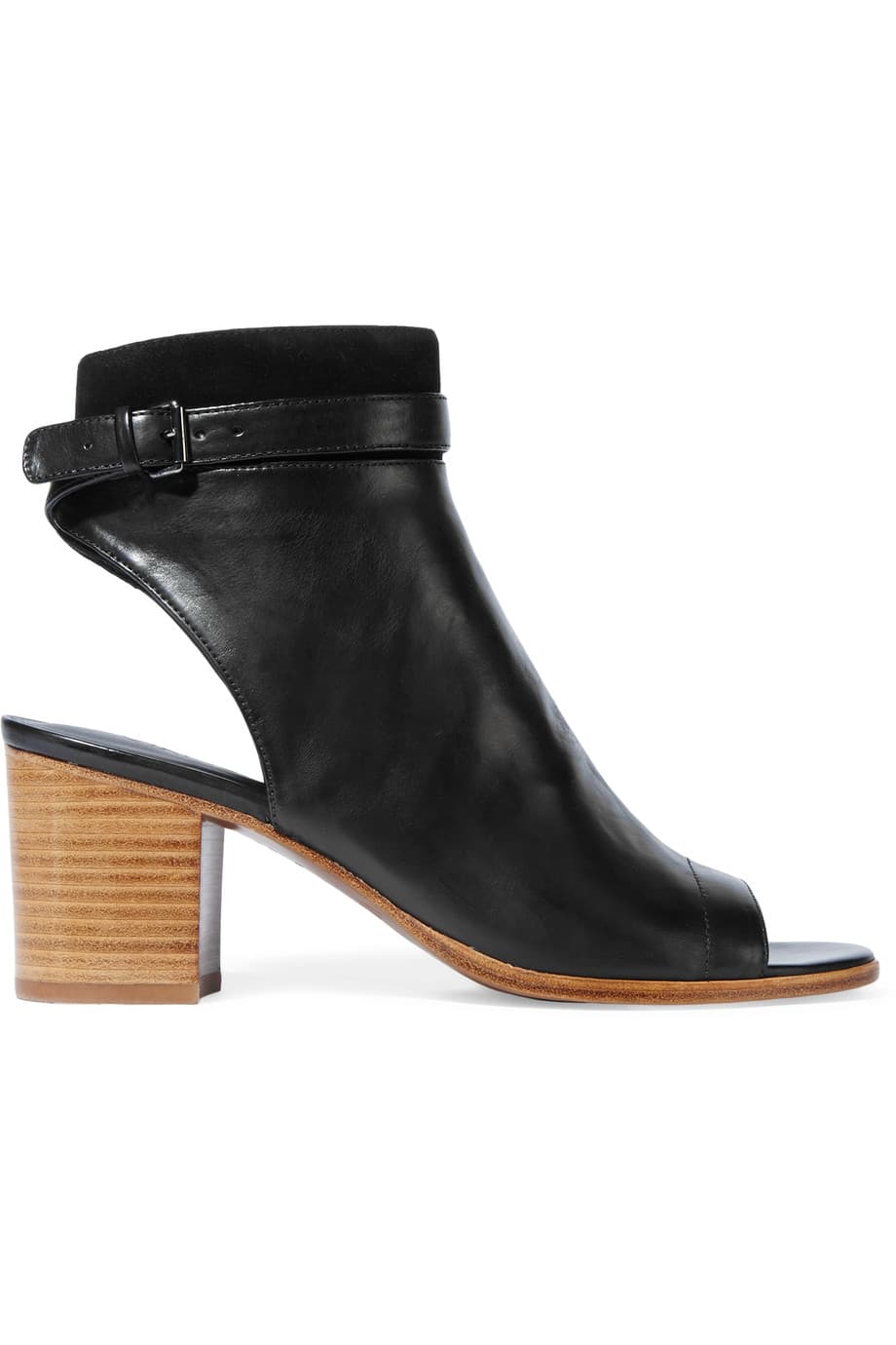 Las sandalias gladiadoras han devenido en una versión más práctica sin perder su escencia. Con la punta de los pies y el talón desnudos, estos zapatos se convirtieron en fieles asistentes a todos los desfiles que vimos pasar en septiembre. Los tacones en madera van mucho mejor para las épocas frías. (Vince
<a href="http://www.net-a-porter.com">www.net-a-porter.com</a>)
<br>