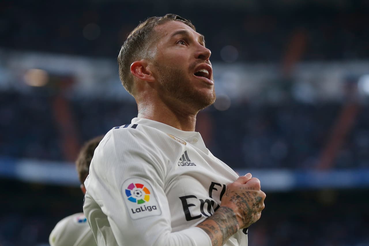 Real Madrid's Sergio Ramos celebrates after scoring his side's 2nd goal from the penalty spot during a Spanish La Liga soccer match between Real Madrid and Valladolid at the Santiago Bernabeu stadium in Madrid, Spain, Saturday, Nov. 3, 2018. (AP Photo/Paul White)