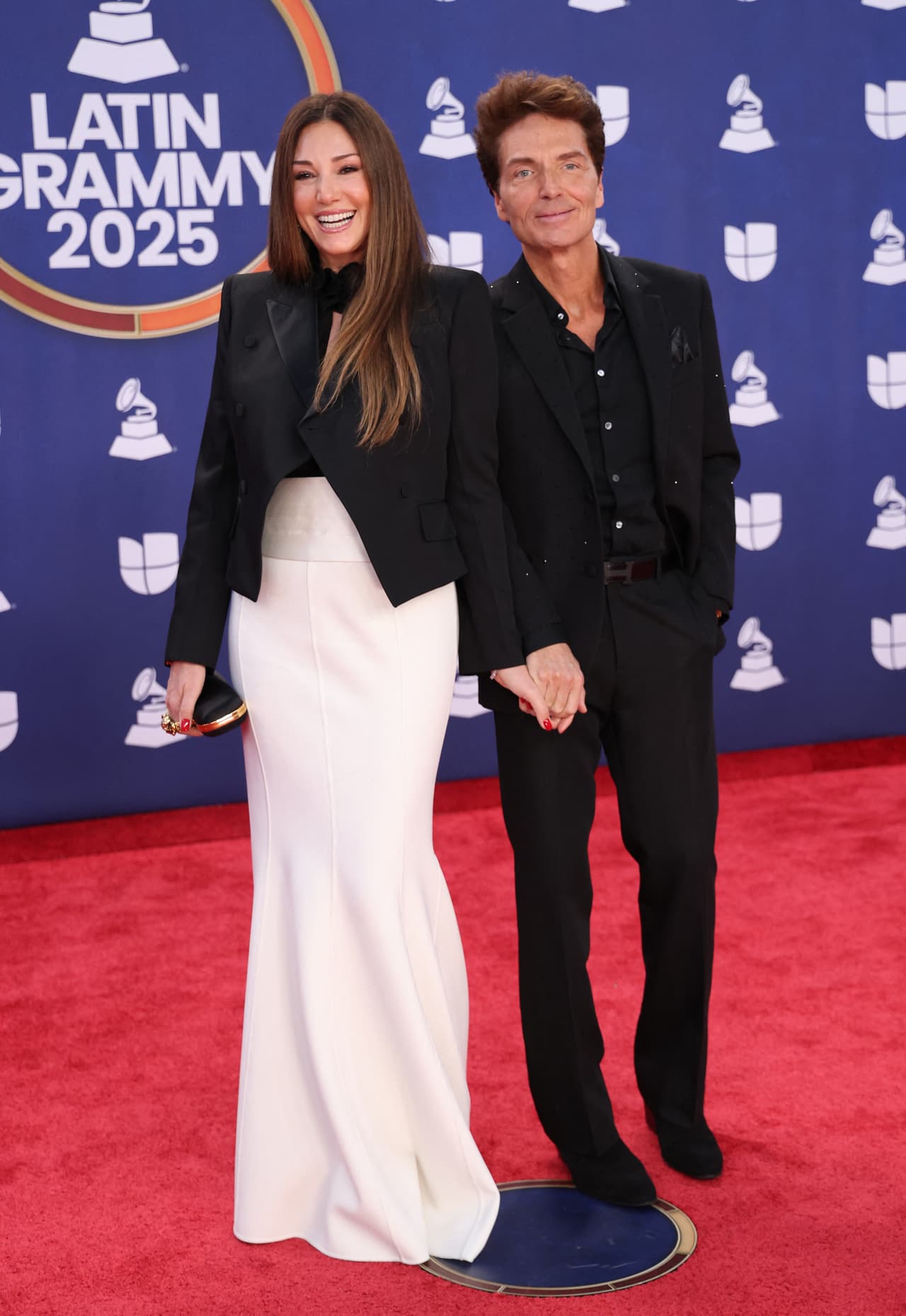 La modelo Daisy Fuentes y su esposo el productor Richard Marx también asistieron.