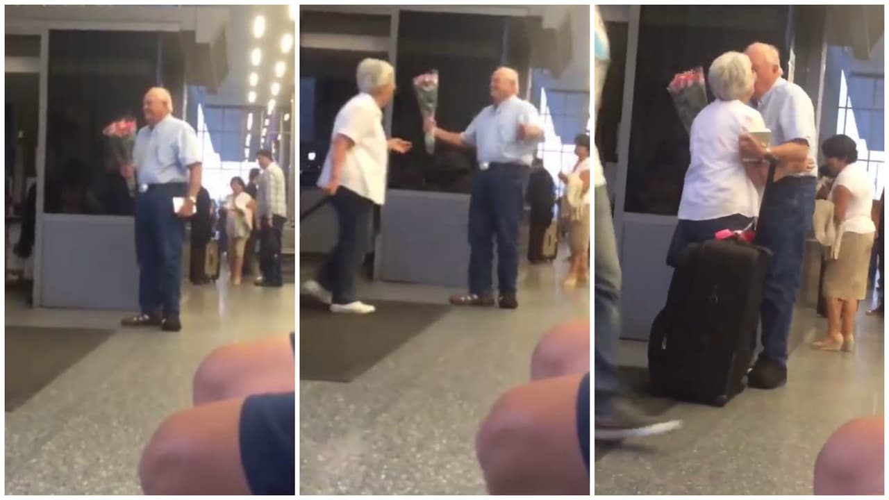 Millones conmovidos por hombre que espera su esposa en aeropuerto con flores