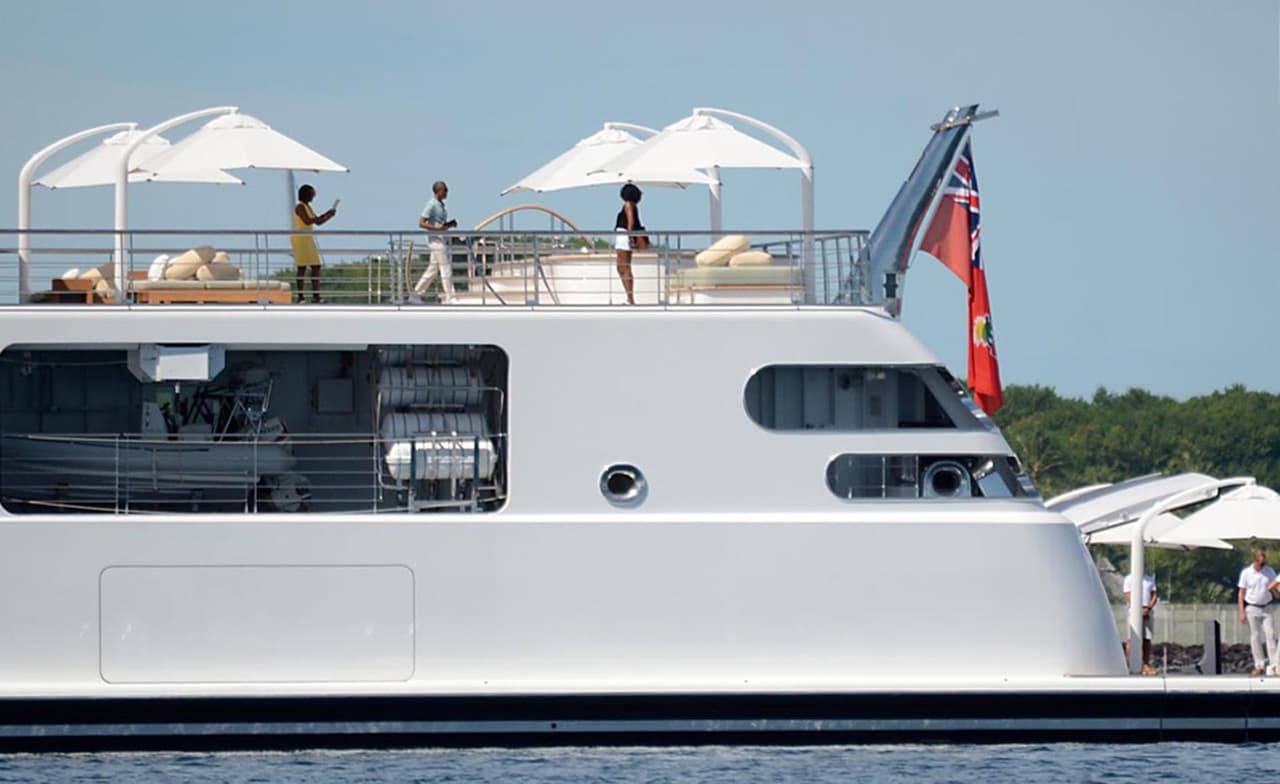 Photo © 2017 Zuma Press/The Grosby Group EXCLUSIVE Moorea, April 14, 2017. Former U.S. President Barack Obama takes a holiday photo of his wife, Michelle, as she poses on the top deck of the 138 meter Rising Sun yacht where the couple and celebrity friends spent the morning off the Island of Moorea, in the South Pacific, part of French Polynesia on April 14, 2017. The Obamas were vacationing with Bruce Springsteen, Tom Hanks and Oprah Winfrey and spent two hours aboard music mogul David Geffen's luxury yacht before leaving Tahiti.