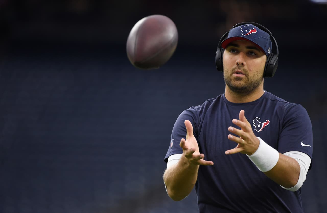 Houston Texans quarterback Tom Savage warms up before an NFL football preseason game against the New England Patriots Saturday, Aug. 19, 2017, in Houston. (AP Photo/Eric Christian Smith)