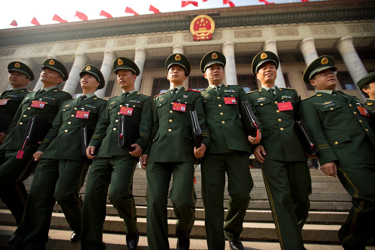 Un grupo de oficiales chinos que participaron en la celebración del congreso del partido comunista.