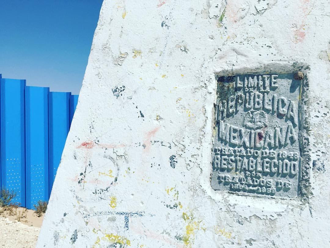 The minimalist painting was done along a 20-meter stretch of the 6-meter-high fence, on a sandy slope that makes access difficult and is just in front of a marker from the International Boundary and Water Commission that reads: Boundary of the Republic of Mexico.