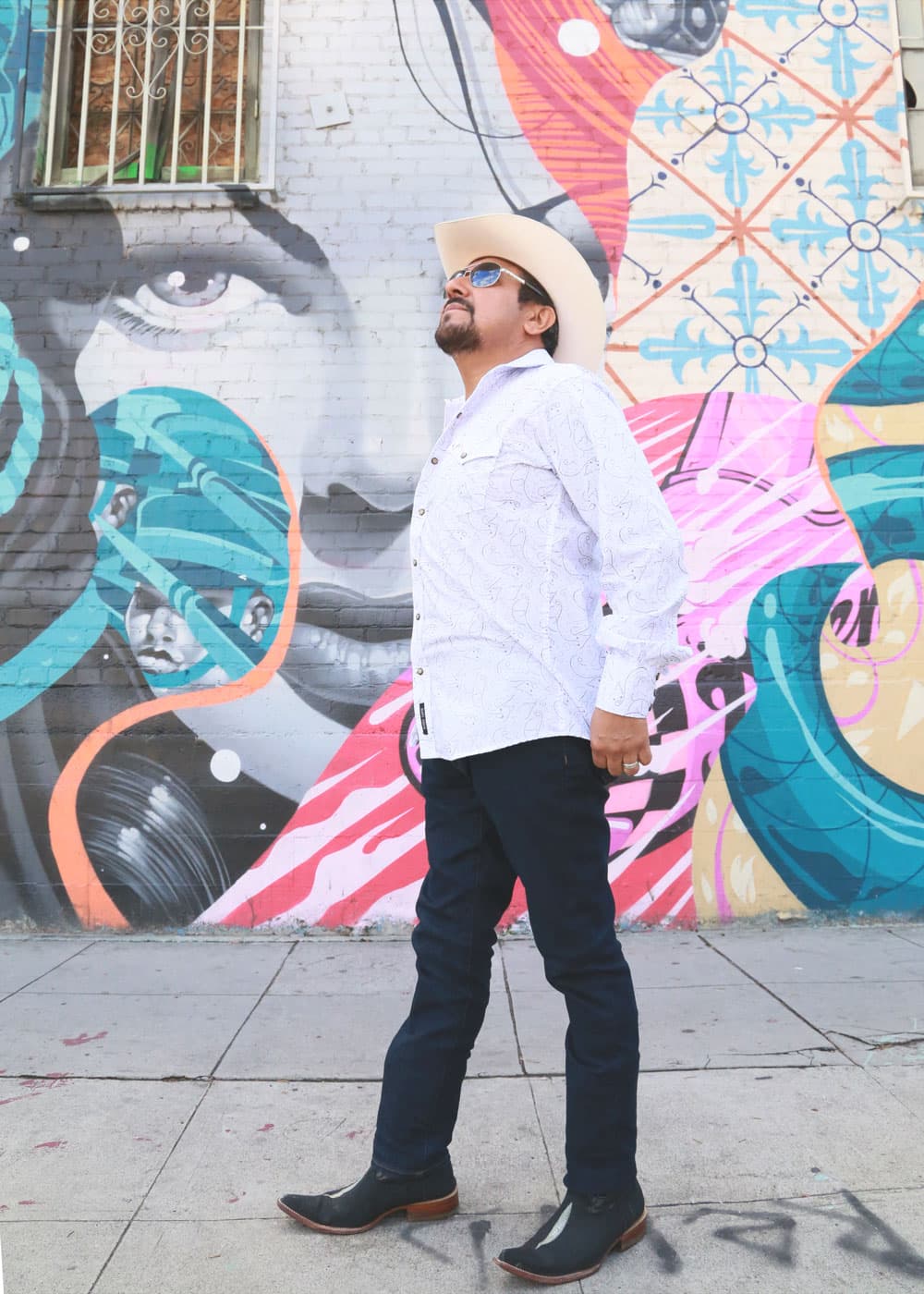 El Feo no dudó tomarse una foto en esta pieza de 
<b>Tristan Eaton, </b>titulada 
<b>'Peace by Piece'.</b>