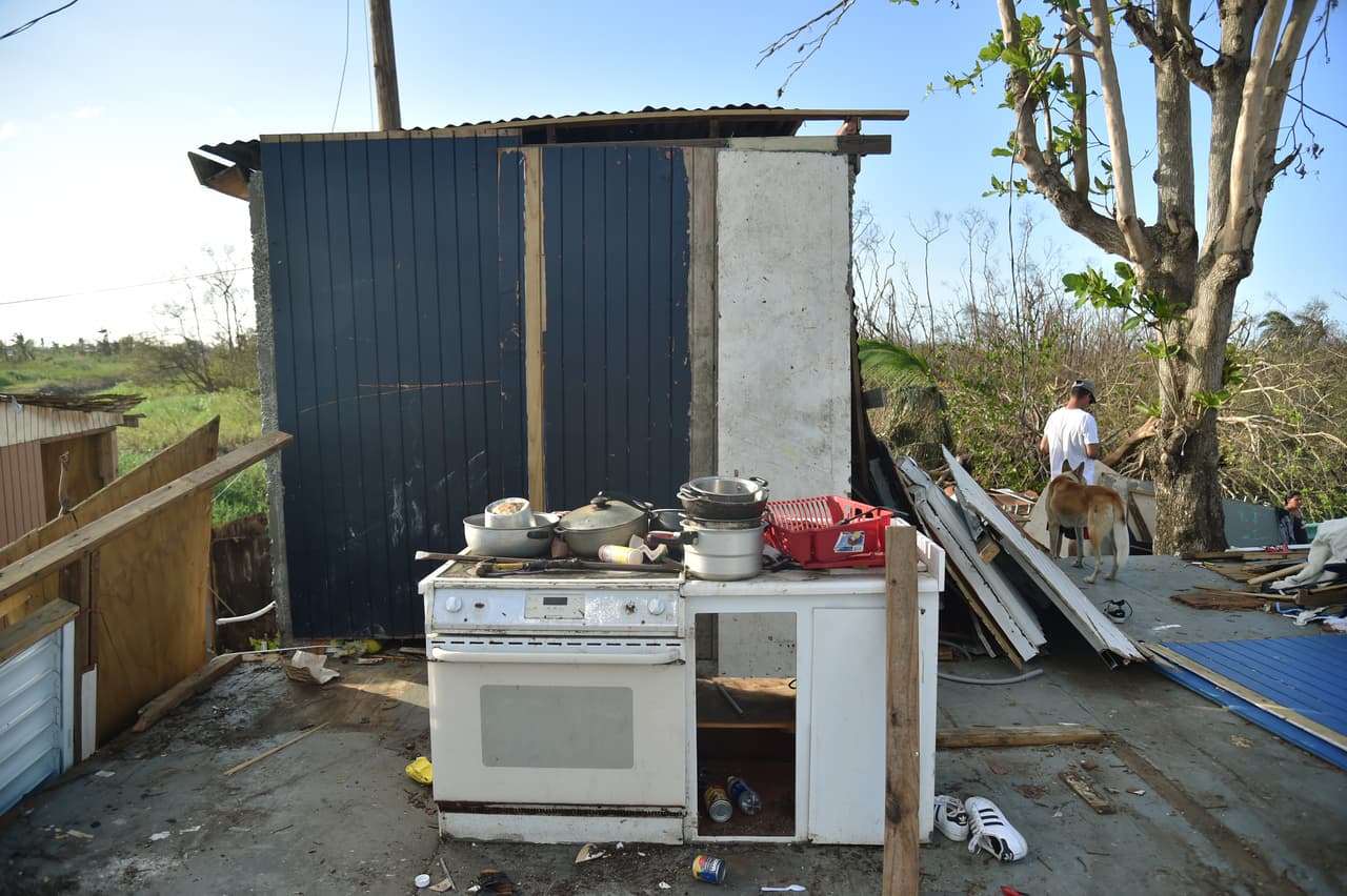 The destroyed Perez family house is seen , in Juana Matos, Catano, Puerto Rico, on October 4, 2017, two weeks after the passage of the Hurricane Maria US President Donald Trump on asked Congress for a bumper $29 billion package of emergency relief after Hurricane Maria slammed into Puerto Rico. / AFP PHOTO / HECTOR RETAMAL (Photo credit should read HECTOR RETAMAL/AFP/Getty Images)