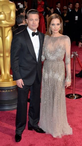 Bradd Pitt y Angeline Jolie en la celebración de los "scar en el Hollywood & Highland Center el 2 de marzo de 2014, en Hollywood, California, antes de la presentación de ella en el escenario y de él recoger el premio por su participación en ¨12 Years a Slave¨, la mejor película del a´ño.