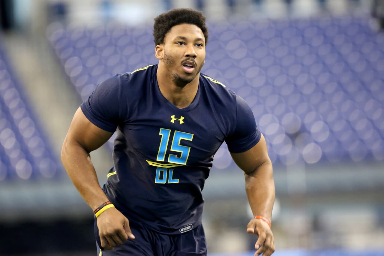 Texas A&M defensive end Myles Garrett competes in a drill at the 2017 NFL football scouting combine Sunday, March 5, 2017, in Indianapolis. (AP Photo/Gregory Payan)