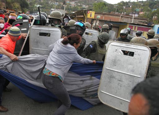 Honduras enfrenta nuevas protestas a una semana de la investidura de Juan Orlando Hernández, señalado por la oposición de fraude