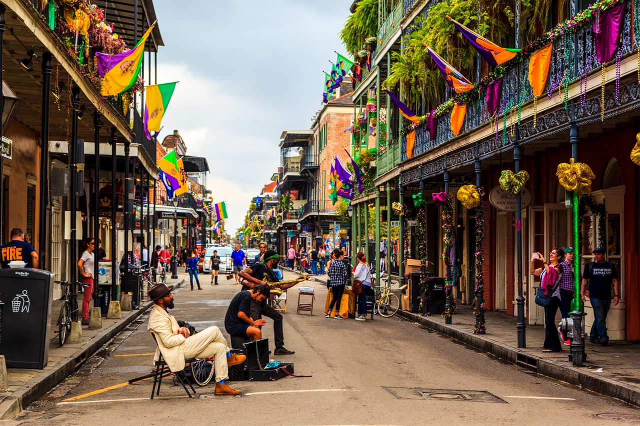 New Orleans USA Feb 2 2016: Street musicians are all over in the French Quarter's streets of New Orleans. People are celebrating and welcoming locals and visitors while enjoying the music. This is an ongoing style of celebration. There are a lot of talented artists in the city