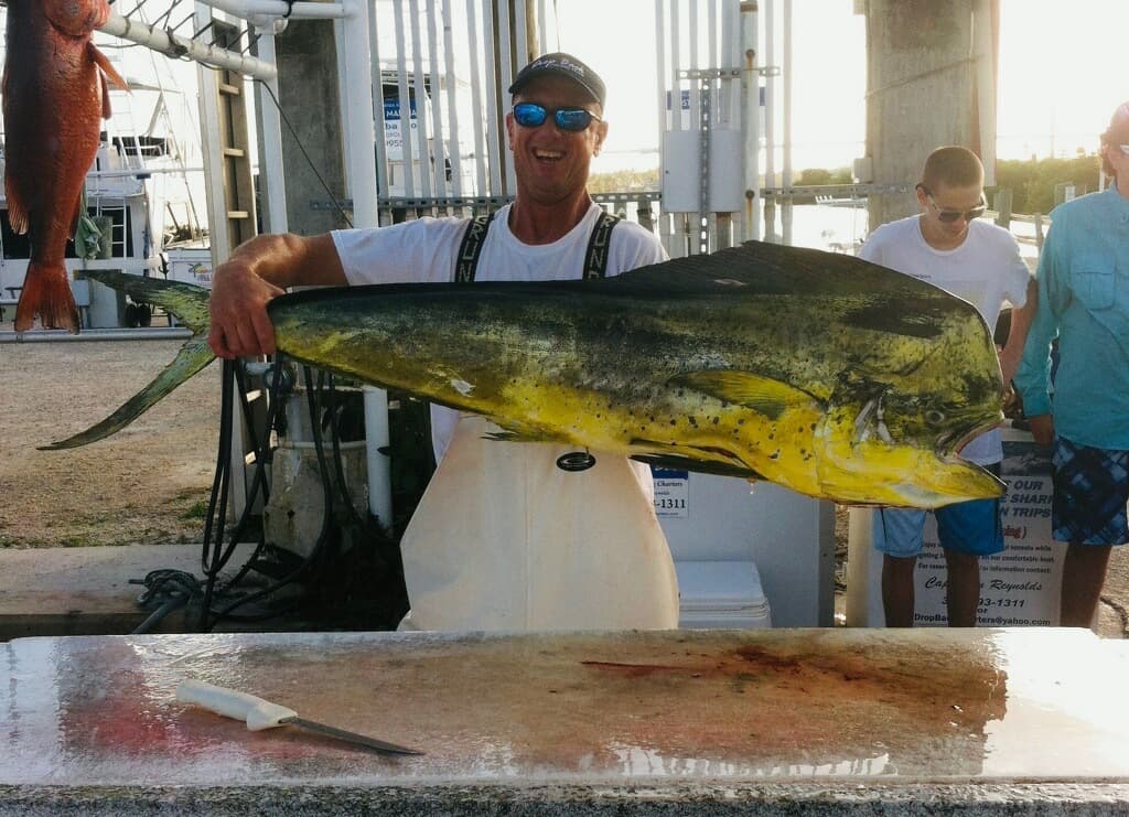 Captain Jon Reynolds with a 42-pound mahi-mahi a decade ago when they were plentiful in Florida waters.