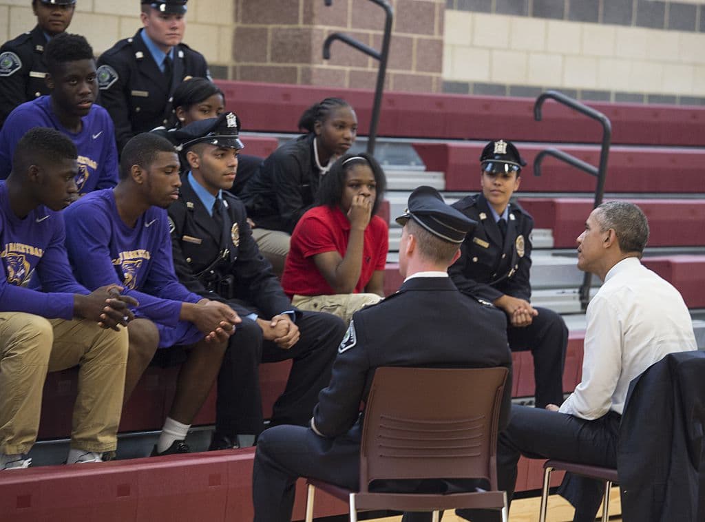 US President Barack Obama(R) meets with youth and law enforcement from the Camden community in Camden, New Jersey, on May 18, 2015. AFP PHOTO/NICHOLAS KAMM (Photo credit should read NICHOLAS KAMM/AFP/Getty Images)