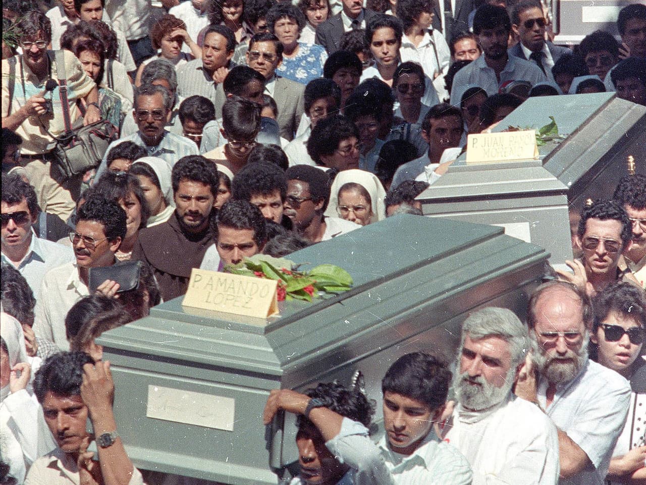 The funeral procession for the six Jesuit priests in San Salvador, El Salvador on Nov. 19, 1989.