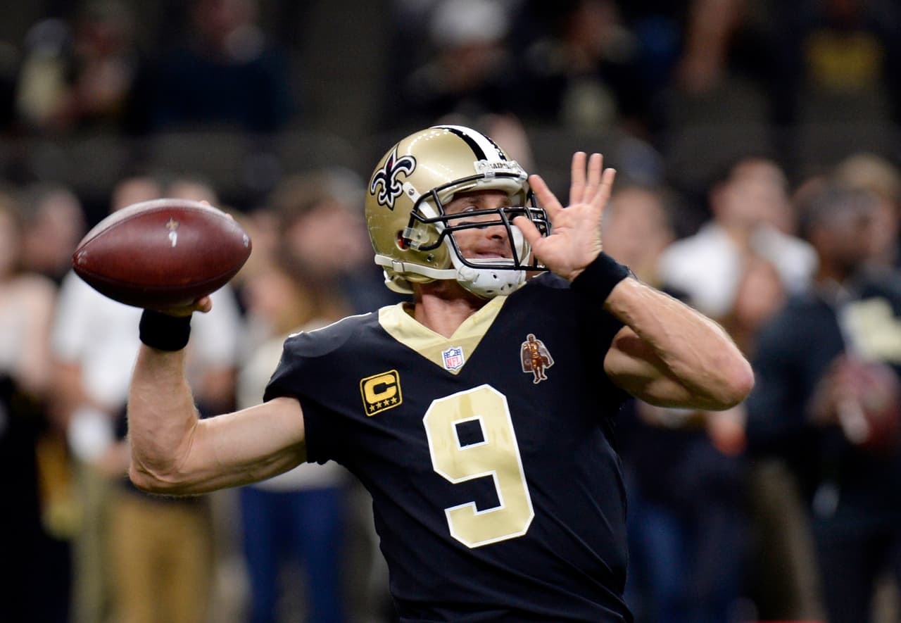 New Orleans Saints quarterback Drew Brees (9) warms up before an NFL football game against the Atlanta Falcons in New Orleans, Sunday, Dec. 24, 2017. (AP Photo/Bill Feig)