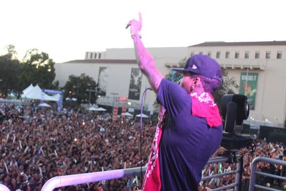 Kid Ink performed high above the crowd from the Coors Light stage! See exclusive pics of his high energy performance!