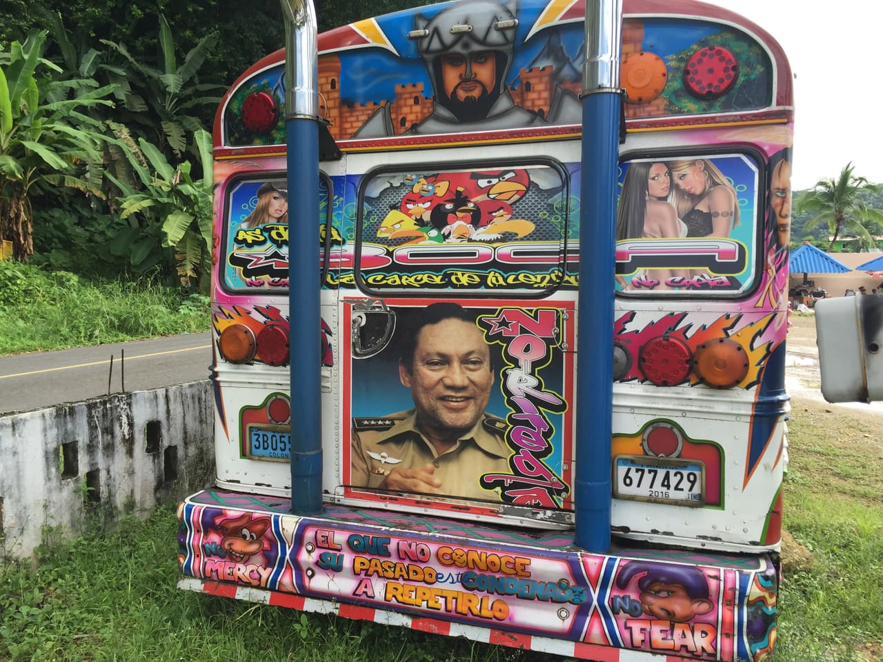A bus with graffiti that recalls the era of the strong military man, General Manuel Antonio Noriega. It reads: "He who does not know the past is destined to repeat it." Portobelo, Panama, 2016.