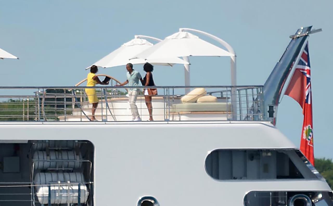 Photo © 2017 Zuma Press/The Grosby Group EXCLUSIVE Moorea, April 14, 2017. Former U.S. President Barack Obama takes a holiday photo of his wife, Michelle, as she poses on the top deck of the 138 meter Rising Sun yacht where the couple and celebrity friends spent the morning off the Island of Moorea, in the South Pacific, part of French Polynesia on April 14, 2017. The Obamas were vacationing with Bruce Springsteen, Tom Hanks and Oprah Winfrey and spent two hours aboard music mogul David Geffen's luxury yacht before leaving Tahiti.