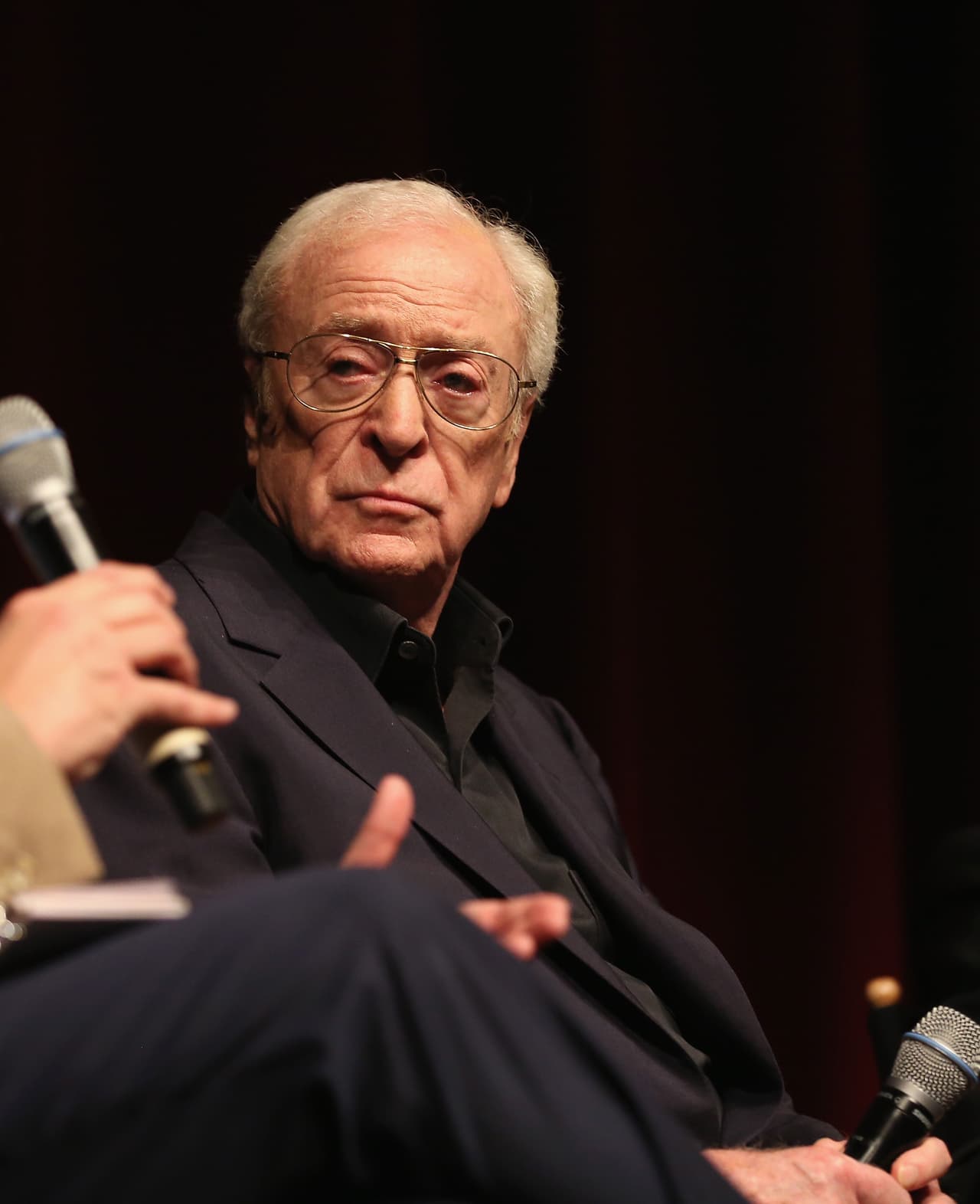 Michael Caine in conference