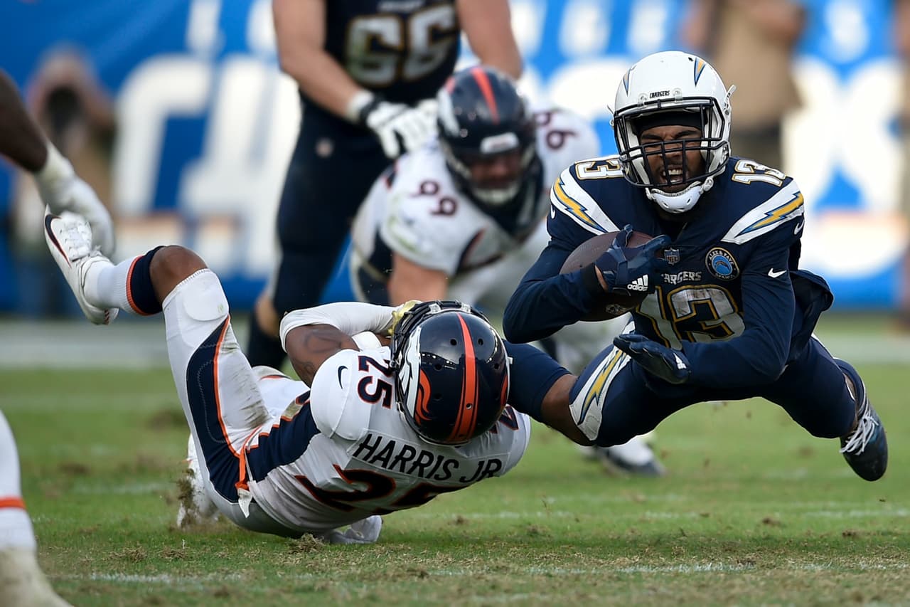 Keenan Allen (13) atrapó nueve pases para ganancia de 89 yardas con un touchdown para los Chargers.