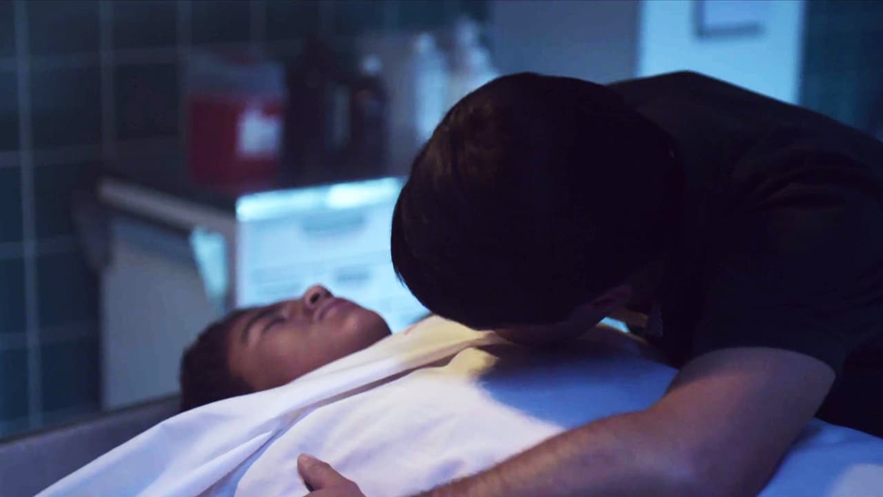 Upon seeing his lifeless body, pain took over him. He held the corpse while tears flooded his eyes.