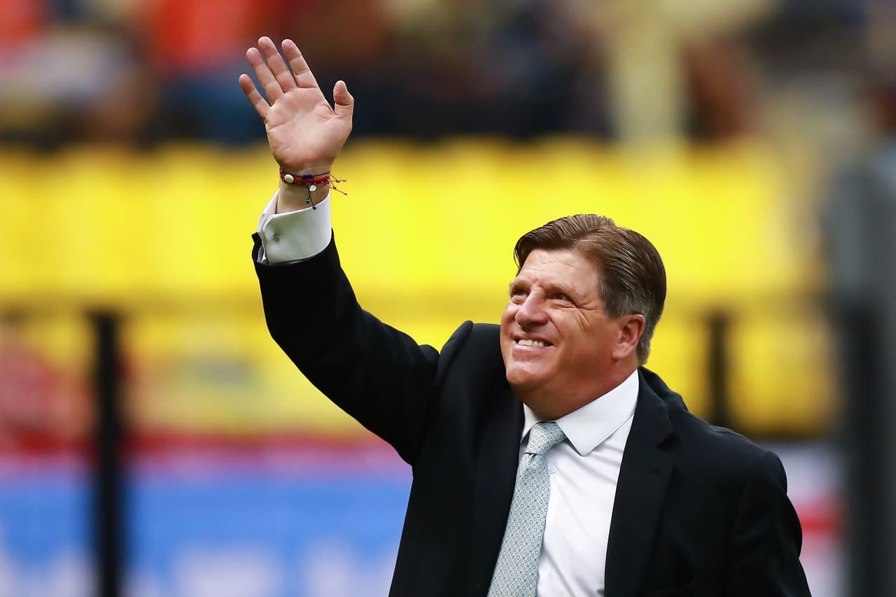 MEXICO CITY, MEXICO - MARCH 09: Miguel Herrera Coach of America waves to fans during a 10th round match between America and Puebla as part of Torneo Clausura 2019 Liga MX at Azteca Stadium on March 9, 2019 in Mexico City, Mexico. (Photo by Hector Vivas/Getty Images)