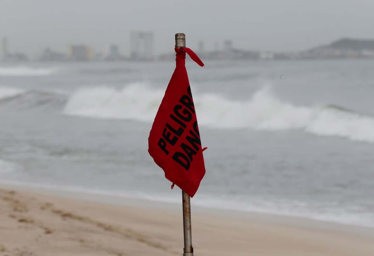 A red flag, warning of dangerous conditions, is seen at a closed beach in Mazatlan as Hurricane Willa approaches the Pacific beach resort, Mexico October 23, 2018. REUTERS/Henry Romero