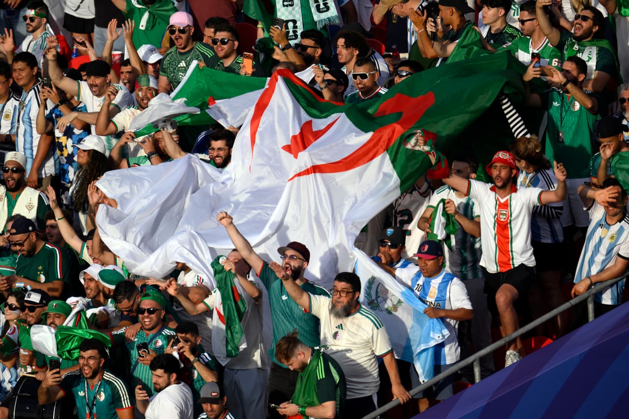Fans cheer before the World Cup Group J soccer match between Argentina and Algeria in Kansas City, Mo., Tuesday, June 16, 2026. (AP Photo/Reed Hoffmann)