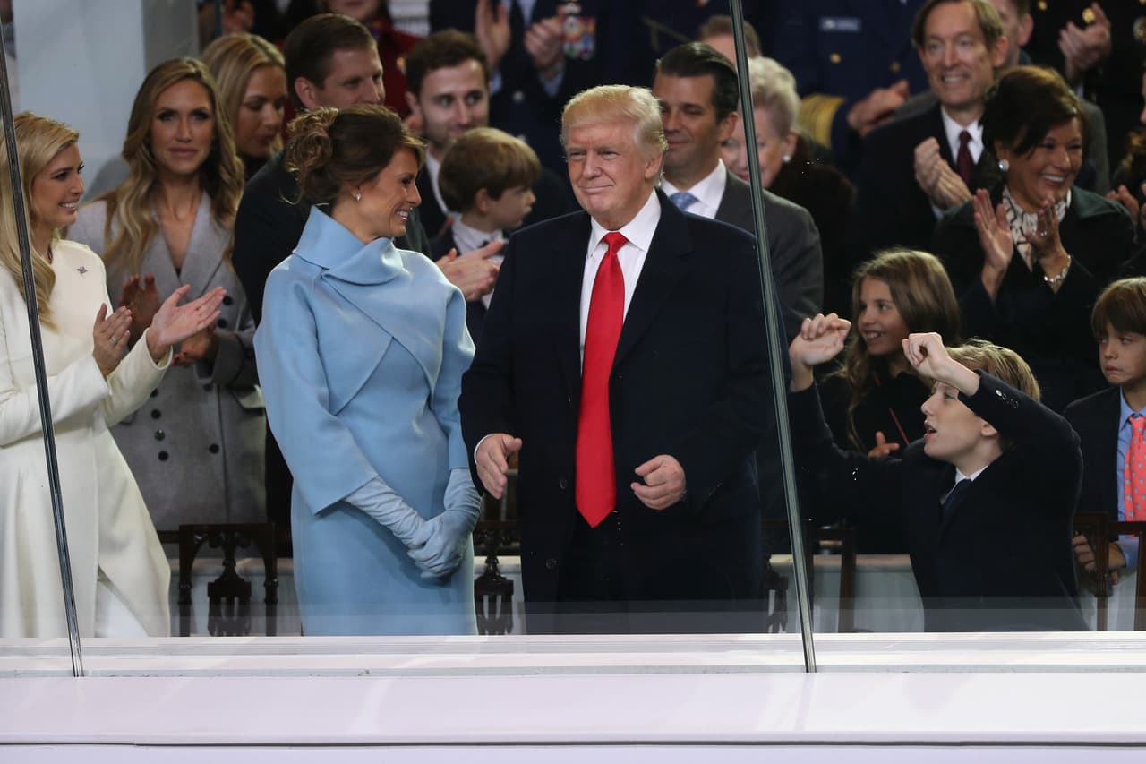 WASHINGTON, DC - JANUARY 20: (L-R) Ivanka Trump, first lady Melania Trump, U.S. President Donald Trump and Barron Trump watch the Inaugural Parade from the main reviewing stand in front of the White House on January 20, 2017 in Washington, DC. Donald J. Trump was sworn in today as the 45th president of the United States. (Photo by Patrick Smith/Getty Images)