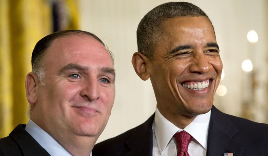 President Barack Obama smiles with chef Jose Andres, after awarding the chef with a "Outstanding American by Choice" award during a naturalization ceremony for active duty service members and civilians, Friday, July 4, 2014, in the East Room of the White House in Washington.