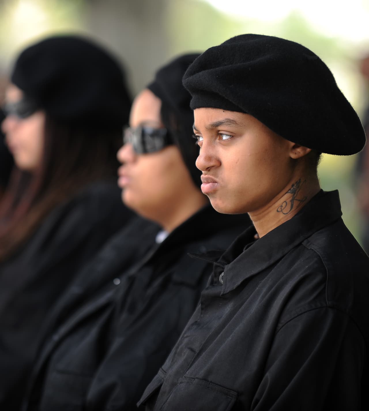 Members of the New Black Panthers group, prepare to attend a demonstration of counterprotesters after the neo-nazi group.
