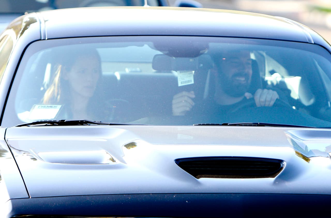 Él no podía borrar su sonrisa.