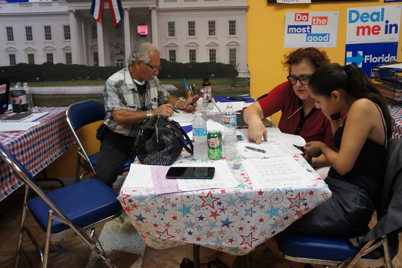 Volunteers make calls in Spanish to Miami voters.