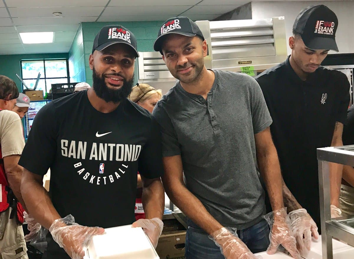 Spurs help serve meals at the local food bank