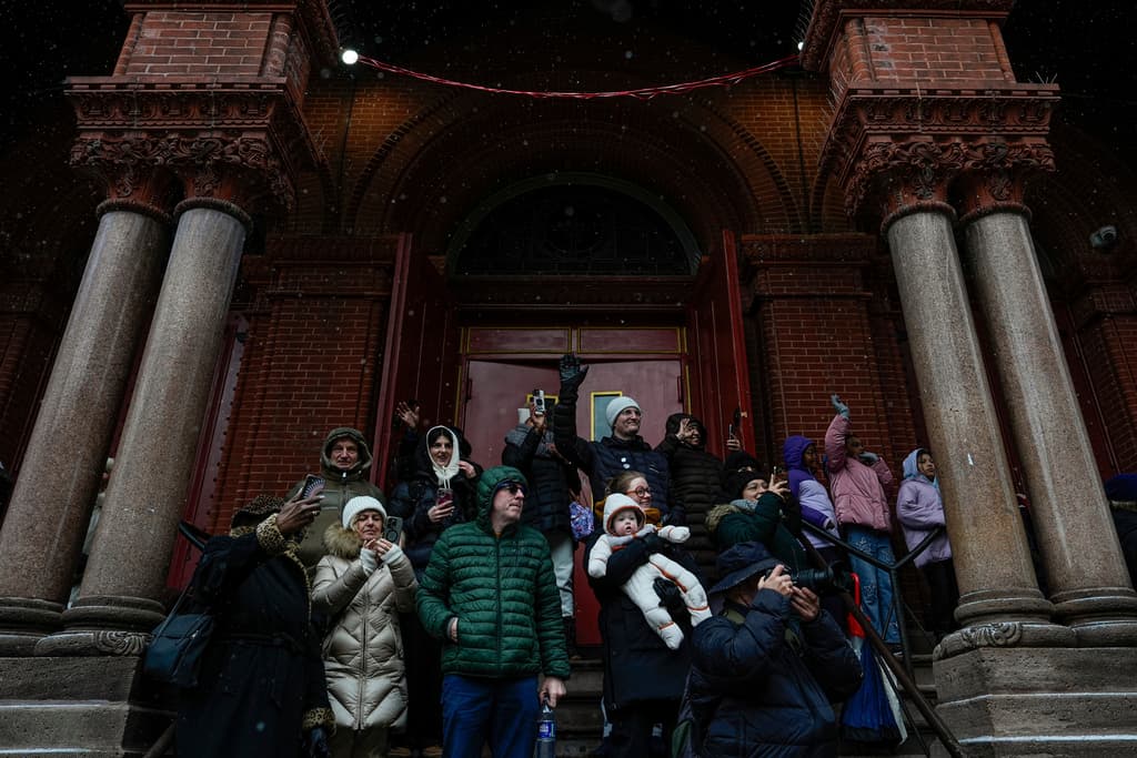 People watch El Museo del Barrio's 47th annual Three Kings Day parade, Monday, Jan. 6, 2025, in New York. (AP Photo/Julia Demaree Nikhinson)