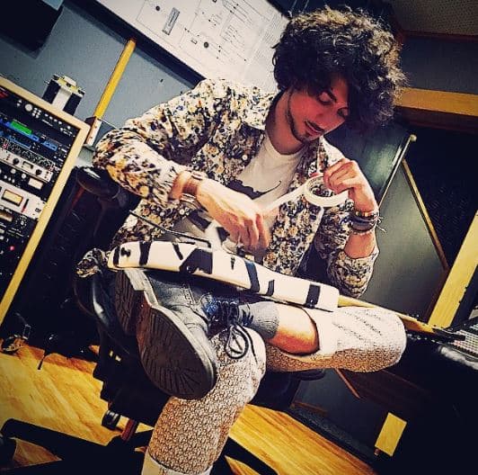 Estudió en la Universidad de Berklee en Boston. Su interés por tocar la guitarra le nació gracias a su medio hermano por parte de su padre.