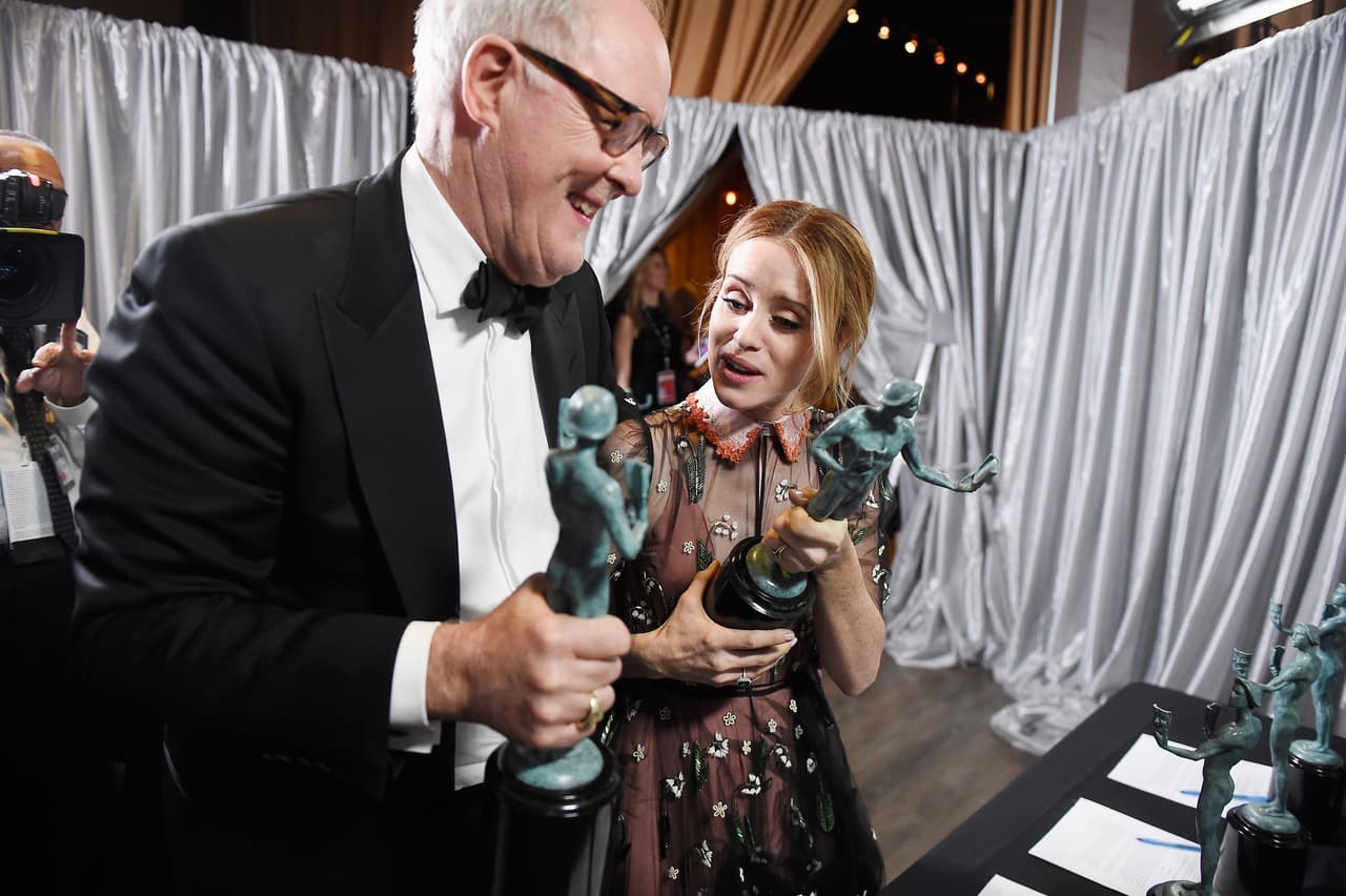 LOS ANGELES, CA - JANUARY 29: Actor John Lithgow (L), winner of the Outstanding Male Actor in a Drama Series for 'The Crown,' and actor Claire Foy, winner of the Outstanding Female Actor in a Drama Series award for 'The Crown,' backstage with awards during The 23rd Annual Screen Actors Guild Awards at The Shrine Auditorium on January 29, 2017 in Los Angeles, California. 26592_017 (Photo by Matt Winkelmeyer/Getty Images for TNT)