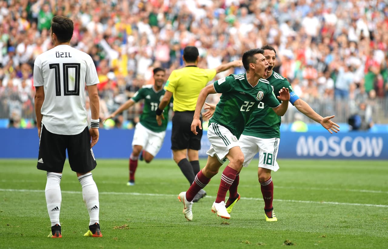 MOSCOW, RUSSIA - JUNE 17: Hirving Lozano of Mexico celebrates with team mate Andres Guardado of Mexico after scoring his team's first goal during the 2018 FIFA World Cup Russia group F match between Germany and Mexico at Luzhniki Stadium on June 17, 2018 in Moscow, Russia. (Photo by Dan Mullan/Getty Images)